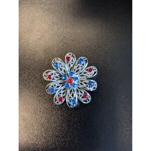 Rare vintage blue and red brooch flower shape silver color scroll